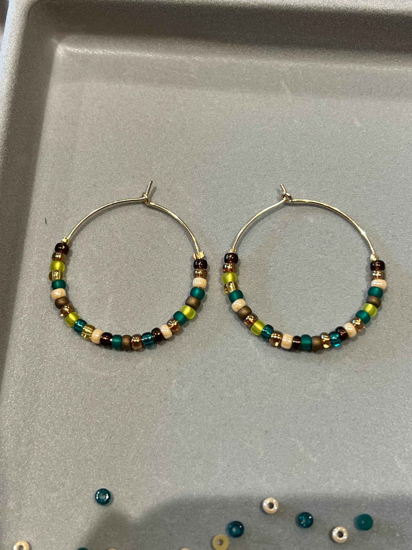 Emerald beaded hoops