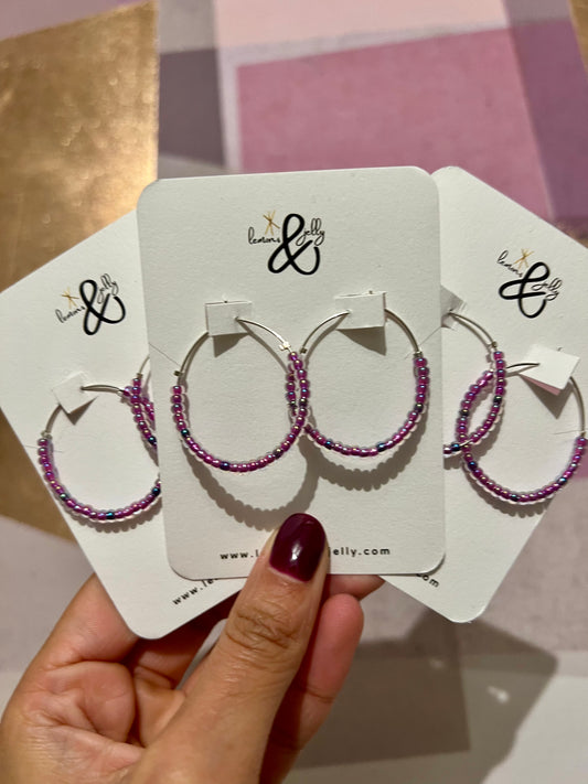 Violet beaded hoops