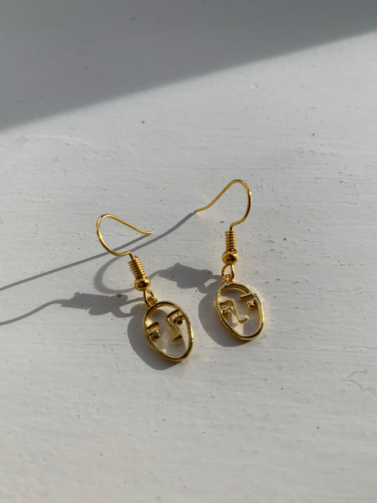 'Face' - gold earrings